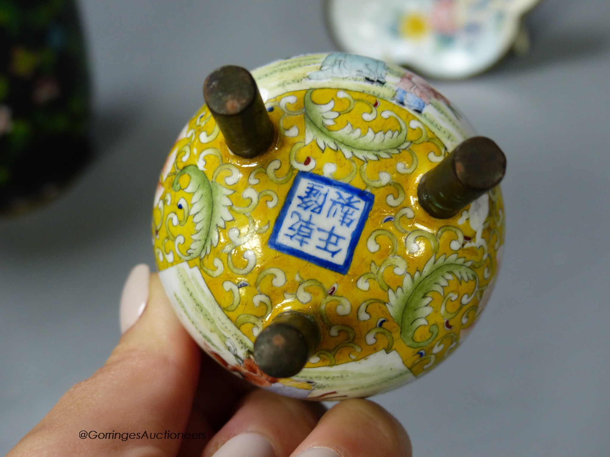 A Chinese enamel on copper tripod censer, a cloisonne enamel vase, 20cm high and a Canton enamel dish